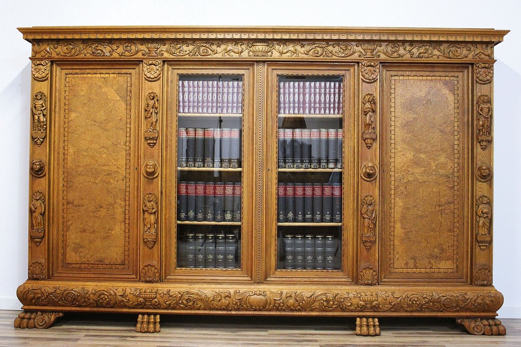 Starožitná neorenesanční knihovna s figurami