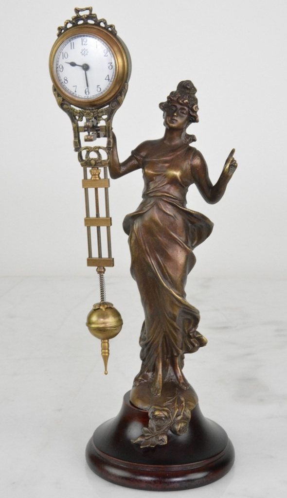 Hodiny - kývačky Junghans s dámou