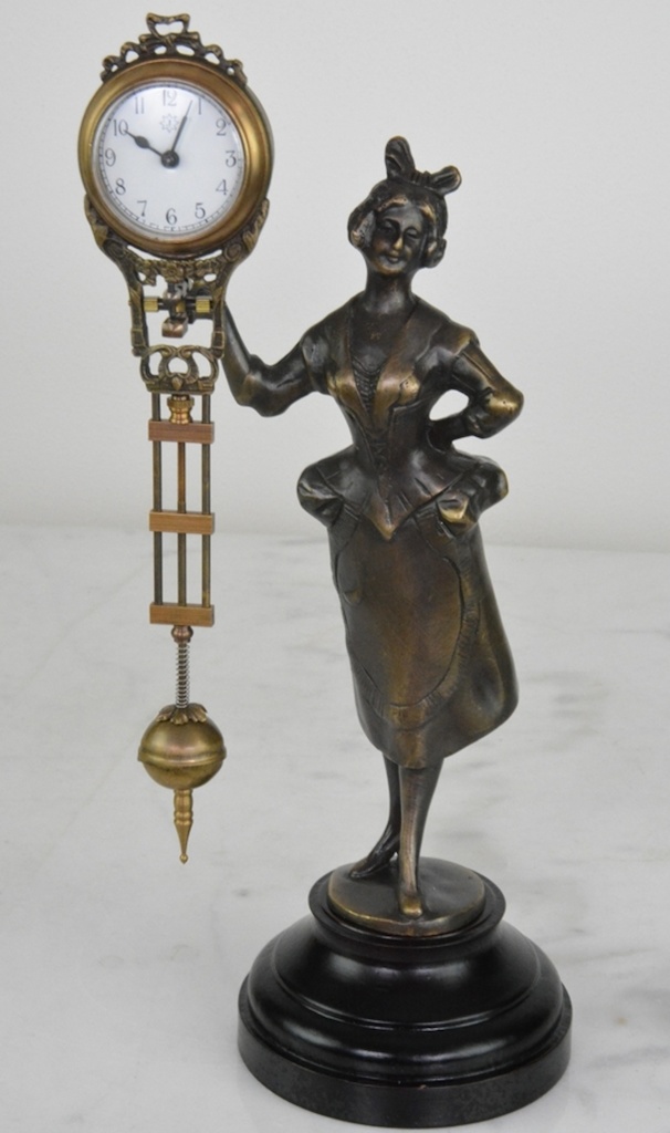 Hodiny - kývačky Junghans s dámou